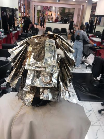 Foil highlights in progress at the salon